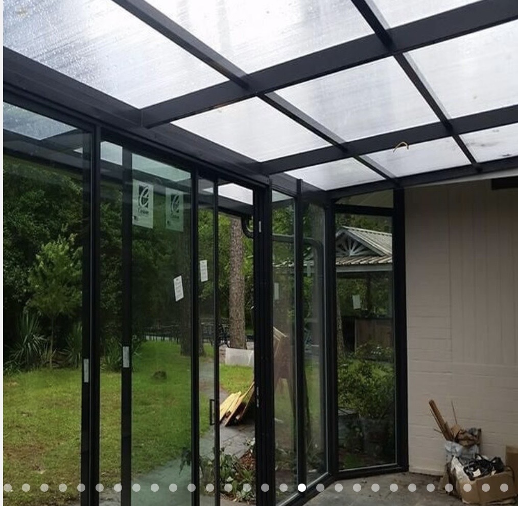 Polycarbonate roof and aluminum framing in a room shown in the CoverWorks gallery